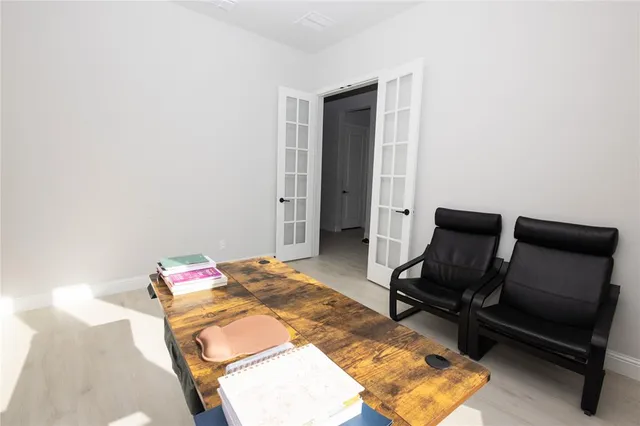 a bedroom with a bed and furniture