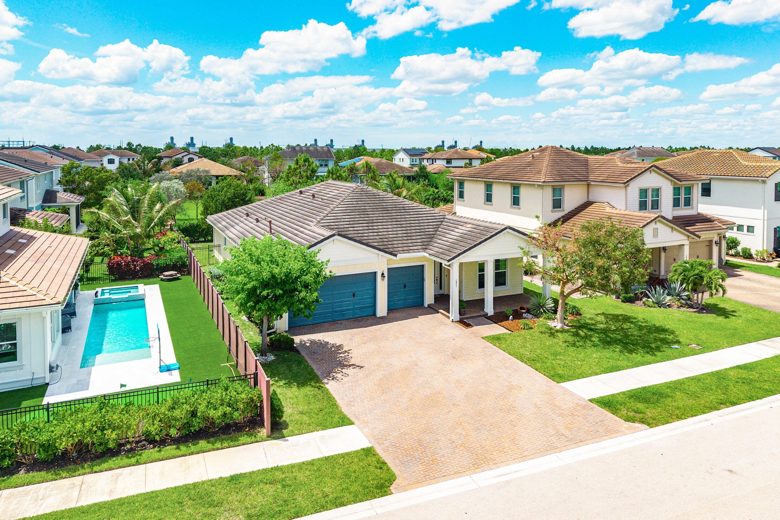 1031 Ember Ridge Run Loxahatchee, FL 33470 - Photo 39 of 52 an aerial view of a house
