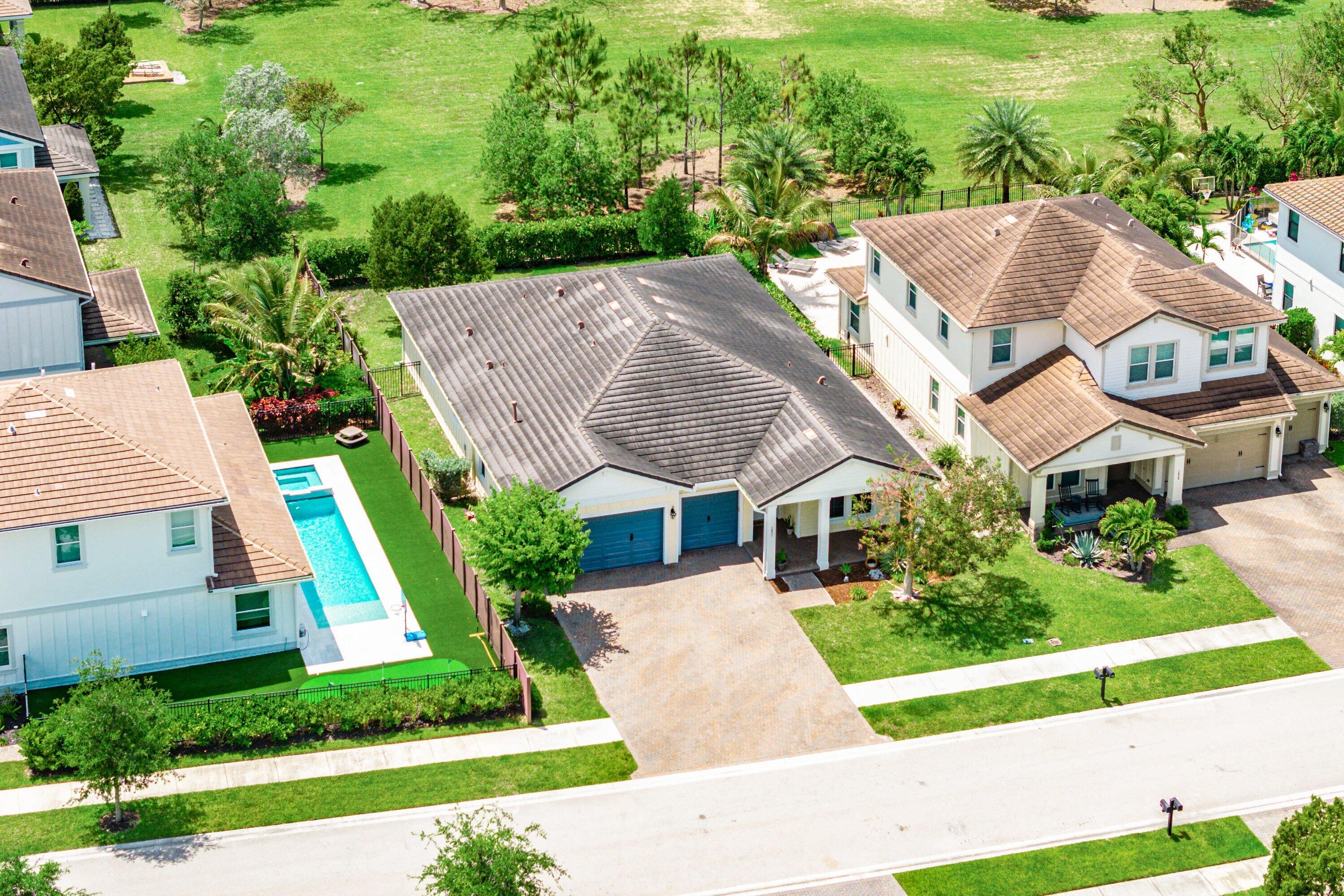 1031 Ember Ridge Run Loxahatchee, FL 33470 - Photo 42 of 52 an aerial view of a house