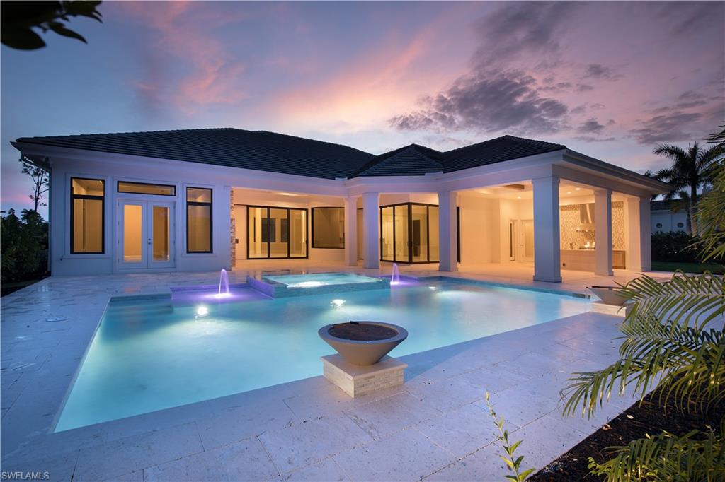 28891 Somers Drive Naples, FL 34119 - Photo 15 of 15 a view of a house with backyard porch and furniture