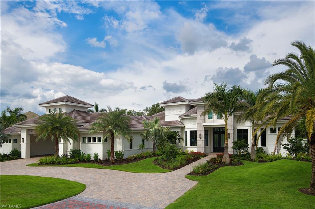 28891 Somers Drive Naples, FL 34119 - Photo 2 of 15 a view of house with a yard and potted plants