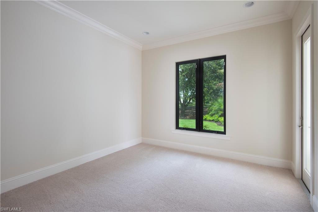 28891 Somers Drive Naples, FL 34119 - Photo 8 of 15 an empty room with a window