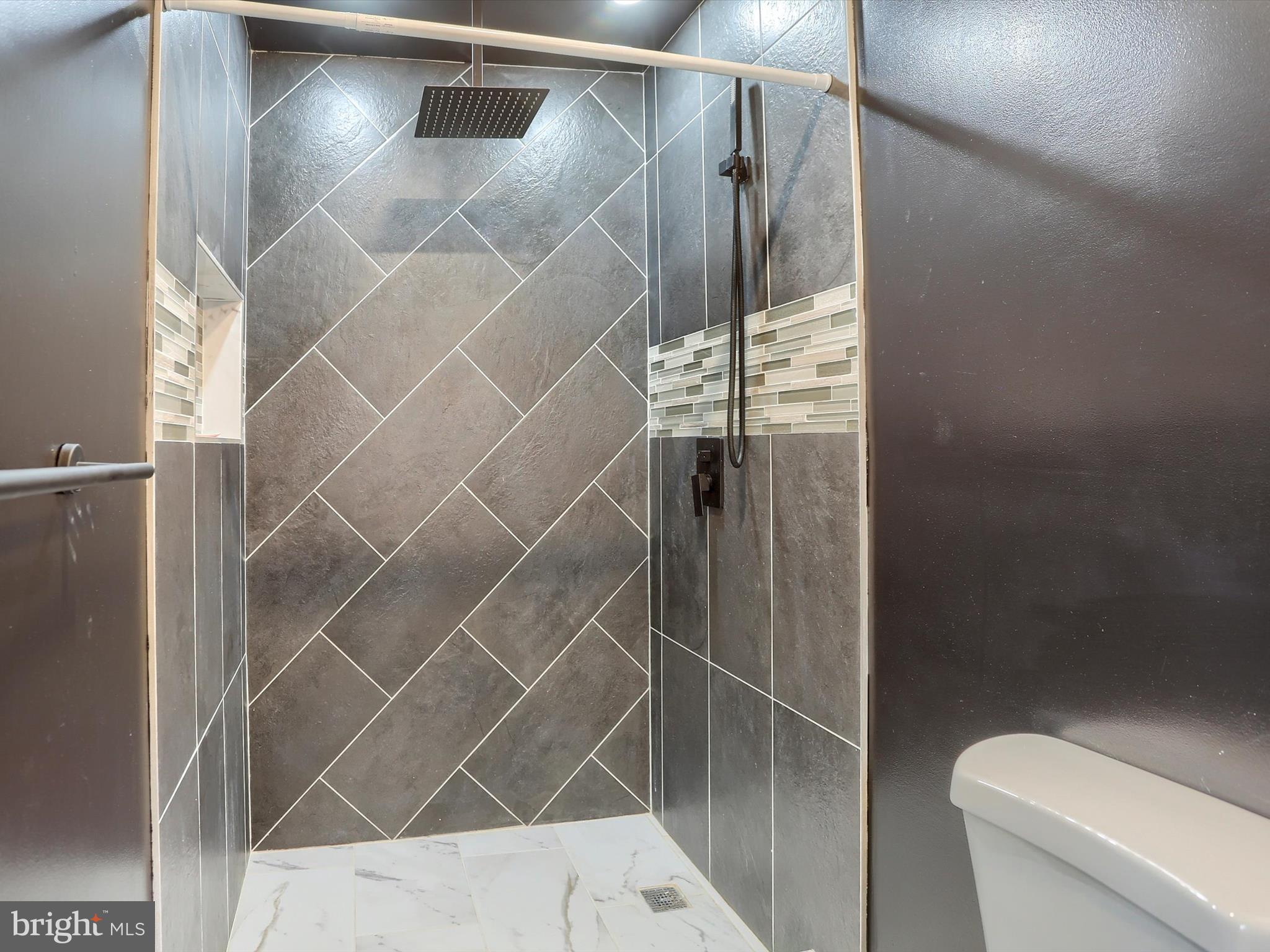 9963 Jonestown Road Grantville, PA 17028 - Photo 20 of 41 a bathroom with a shower and toilet