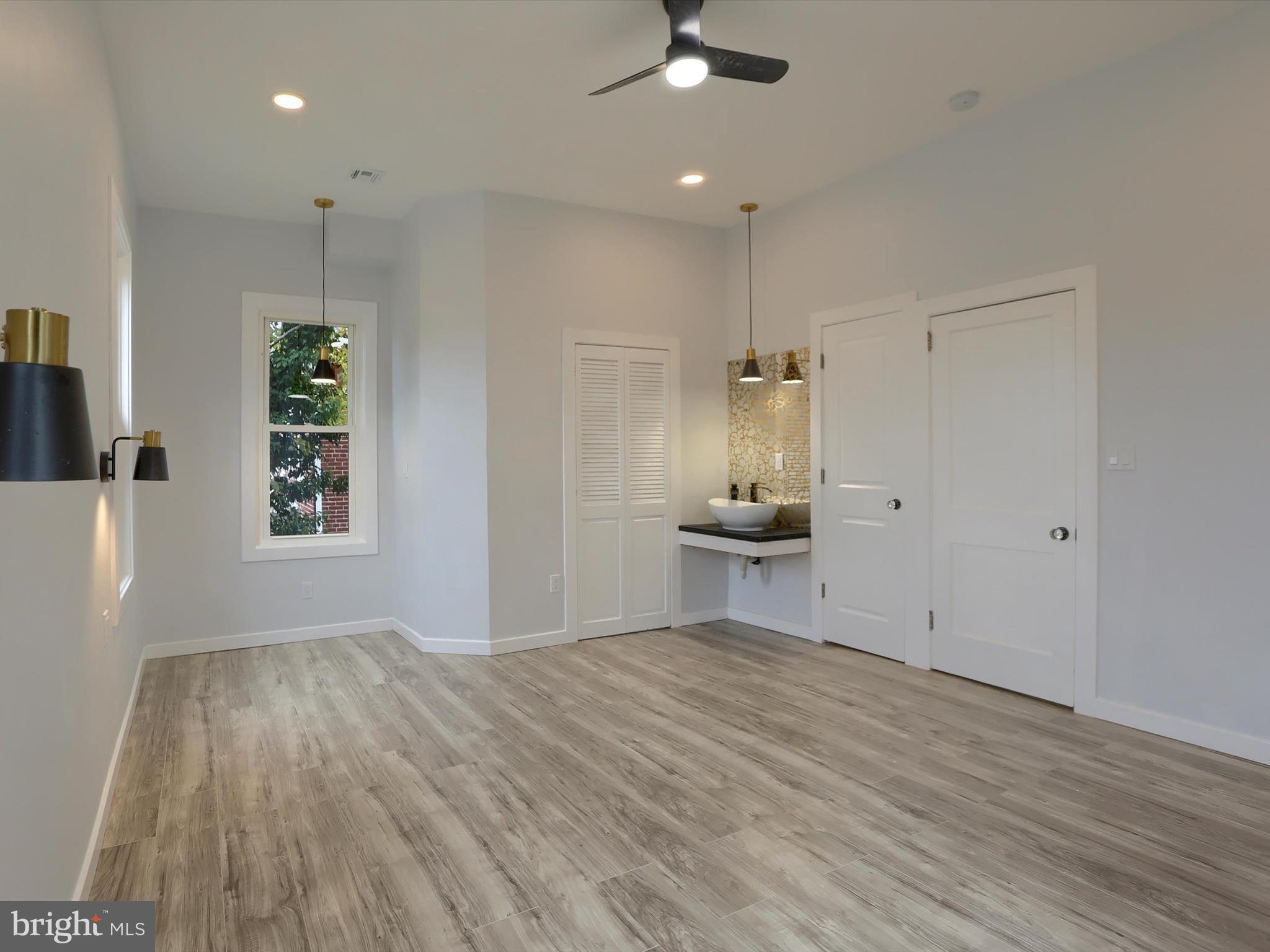 9963 Jonestown Road Grantville, PA 17028 - Photo 26 of 41 a view of empty room with wooden floor