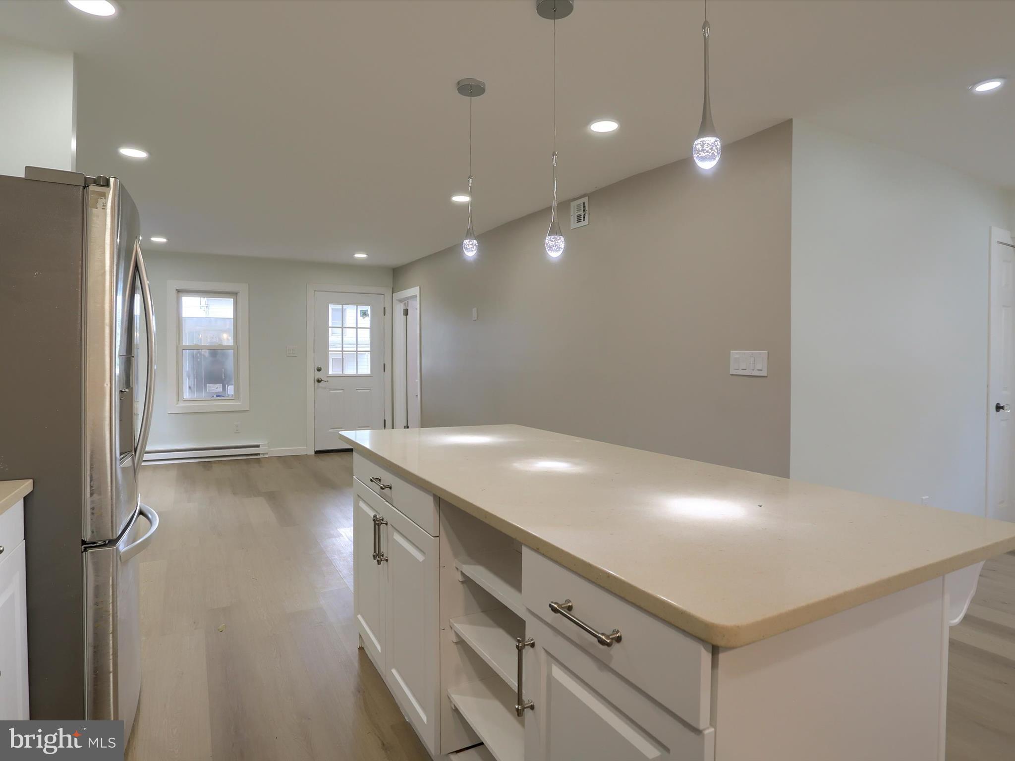 9963 Jonestown Road Grantville, PA 17028 - Photo 10 of 41 a kitchen with a sink and chandelier