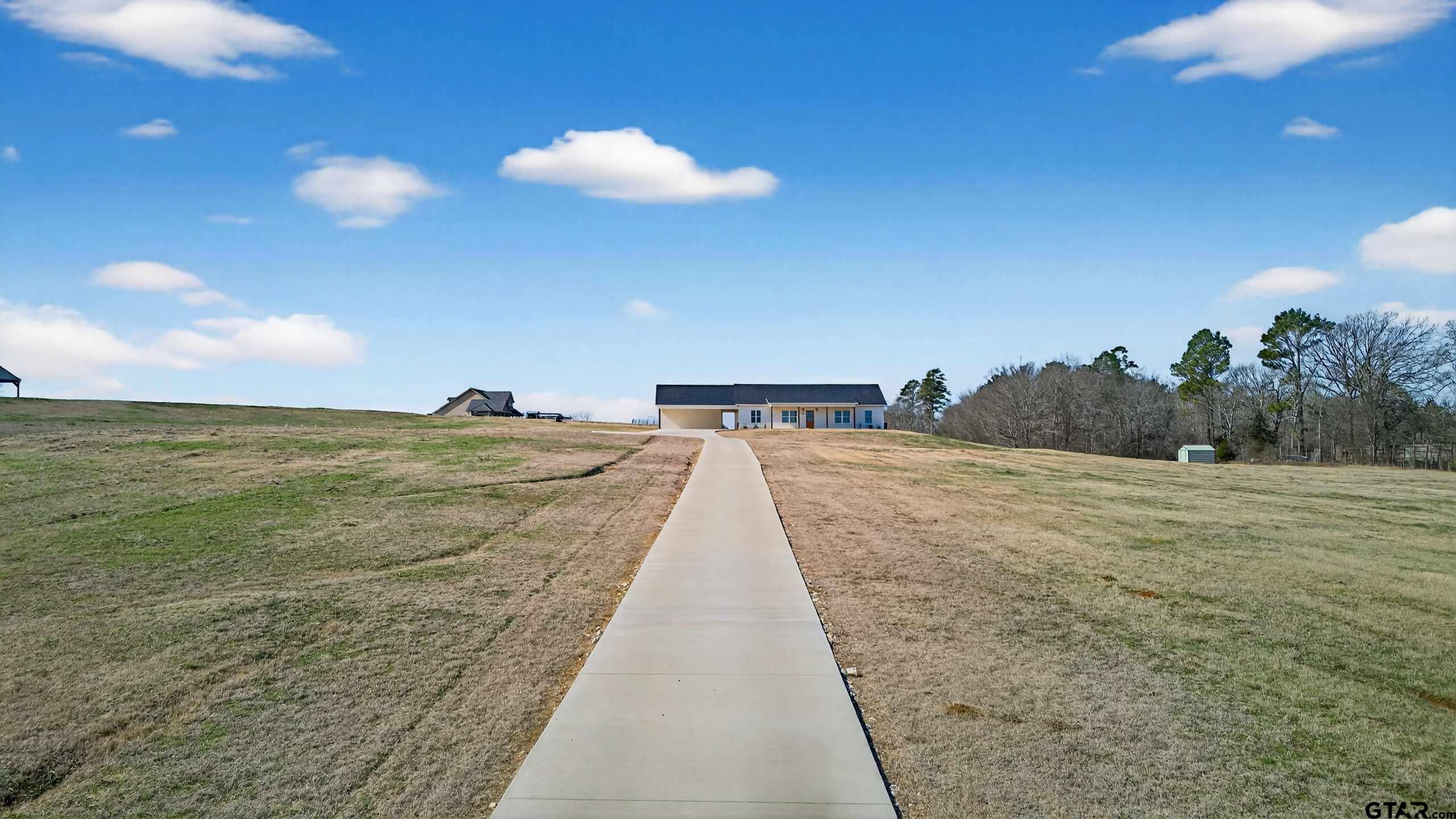 305 Gallatin Cut-Off Road Jacksonville, TX 75766 - Photo 13 of 46 a view of a terrace