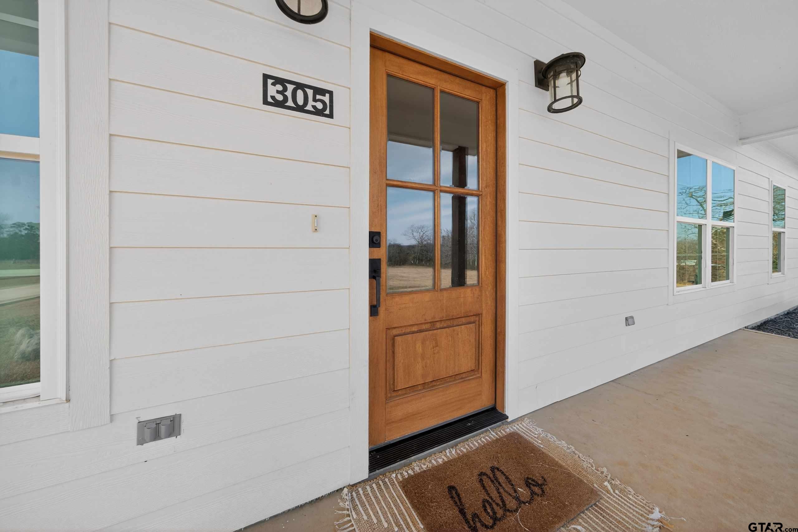 305 Gallatin Cut-Off Road Jacksonville, TX 75766 - Photo 14 of 46 a view of front door