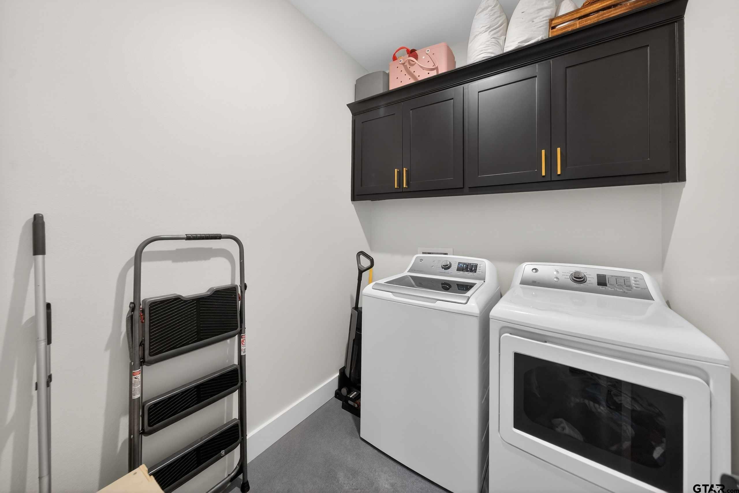 305 Gallatin Cut-Off Road Jacksonville, TX 75766 - Photo 29 of 46 a utility room with dryer and washer