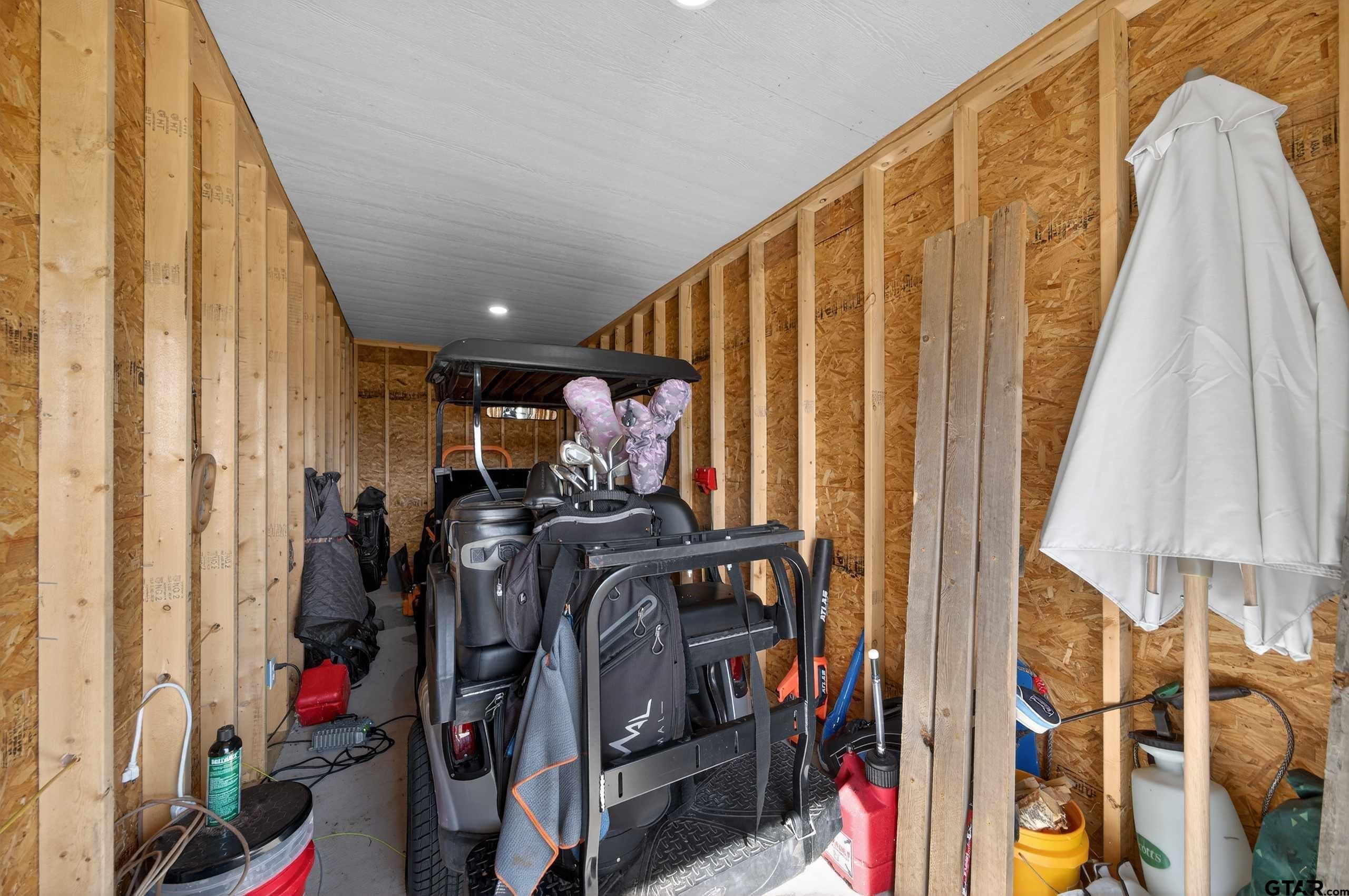 305 Gallatin Cut-Off Road Jacksonville, TX 75766 - Photo 6 of 46 a view of walk in closet with clothes and shoes