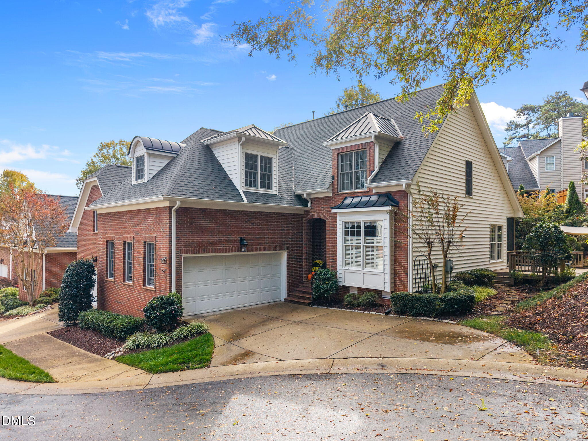 7417 Fontana Ridge Lane Raleigh, NC 27613 - Photo 1 of 54 a front view of a house with a yard and garage