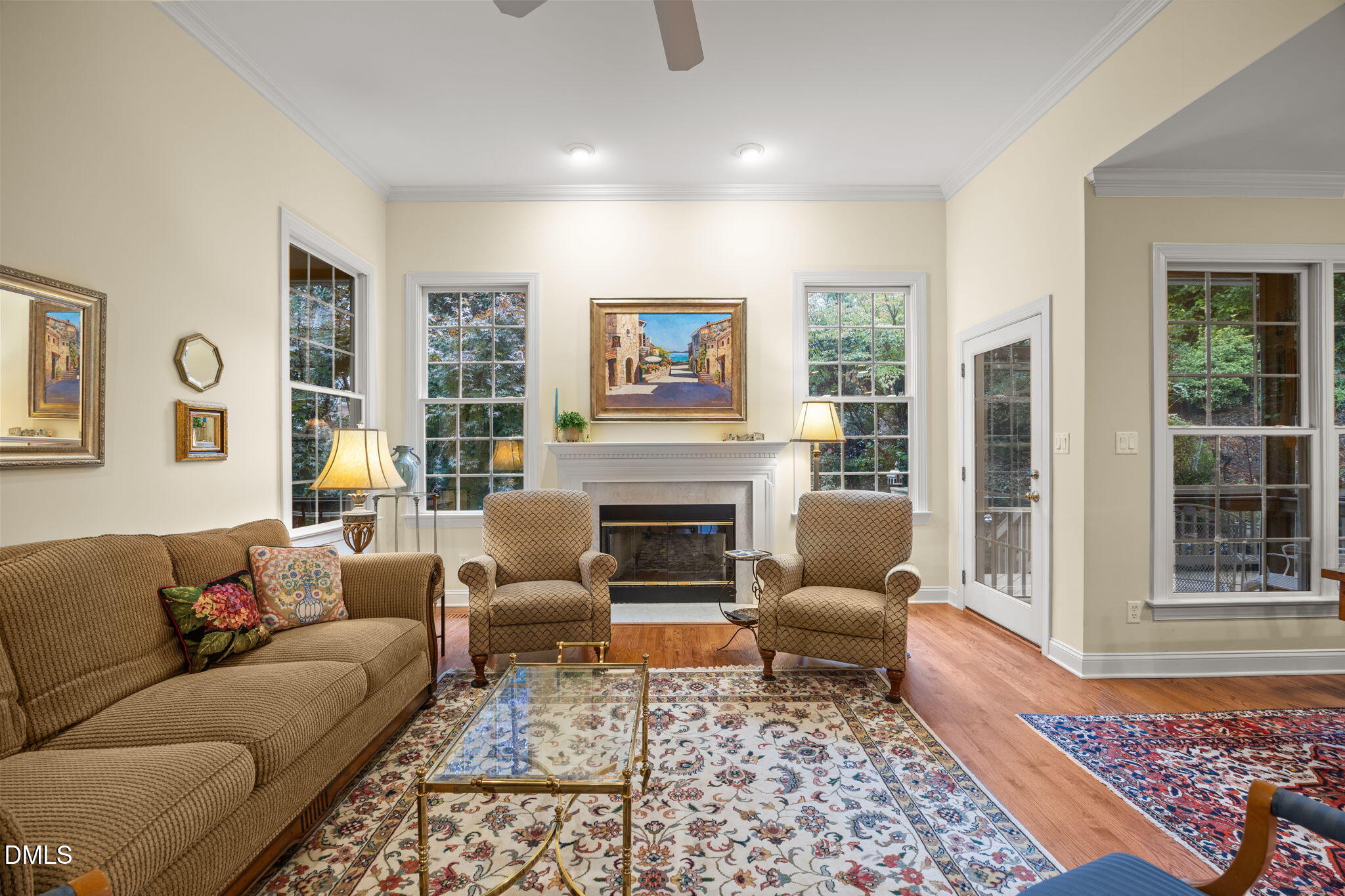 7417 Fontana Ridge Lane Raleigh, NC 27613 - Photo 15 of 54 a living room with furniture and a fireplace