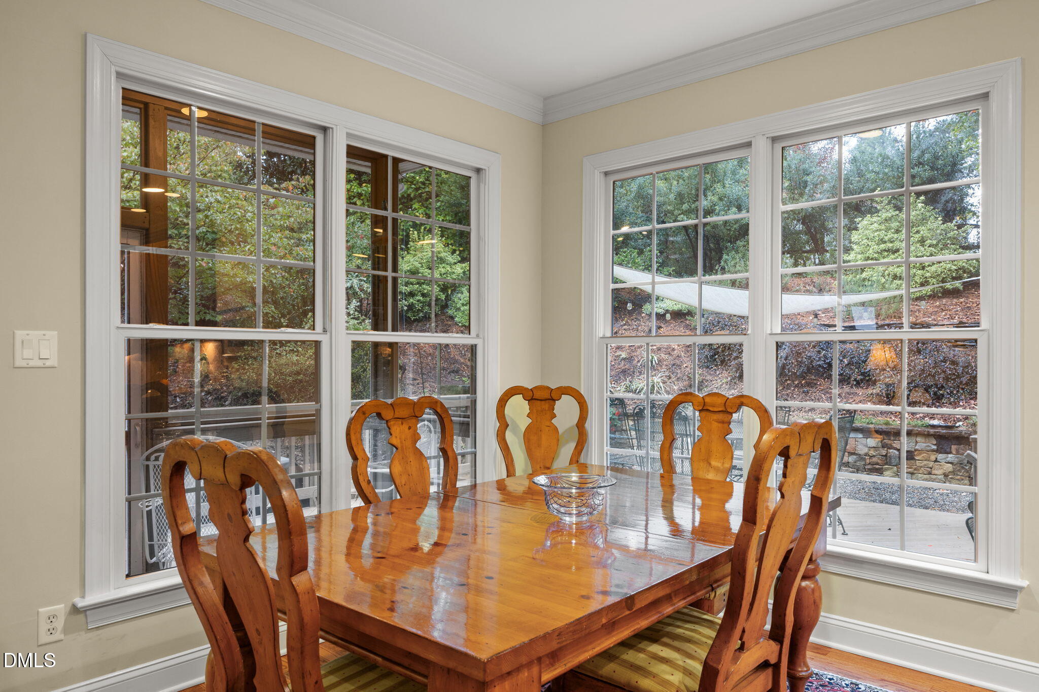 7417 Fontana Ridge Lane Raleigh, NC 27613 - Photo 16 of 54 a dining room with furniture window and outdoor view