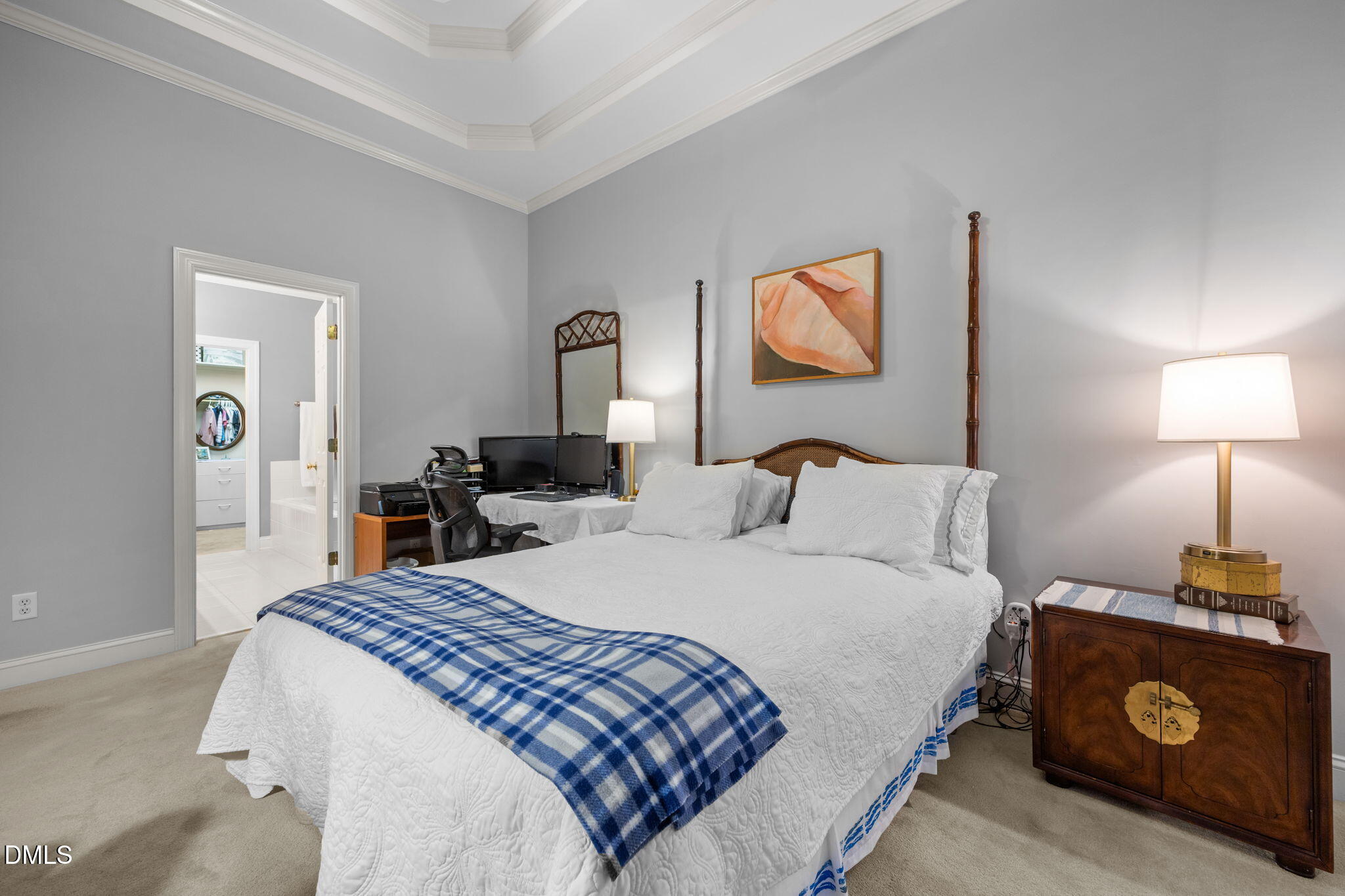 7417 Fontana Ridge Lane Raleigh, NC 27613 - Photo 24 of 54 a bedroom with a bed and a lamp on dresser