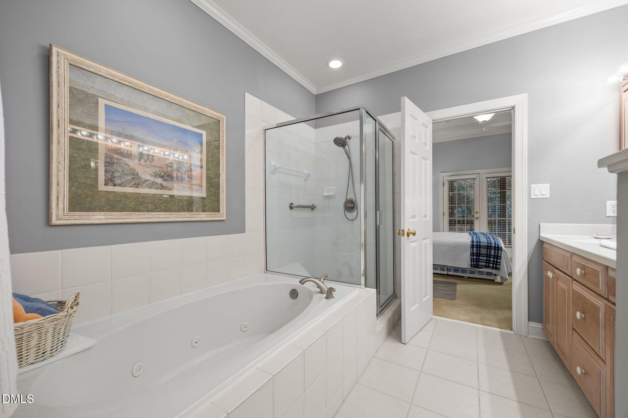 7417 Fontana Ridge Lane Raleigh, NC 27613 - Photo 26 of 54 a spacious bathroom with a bathtub and a shower