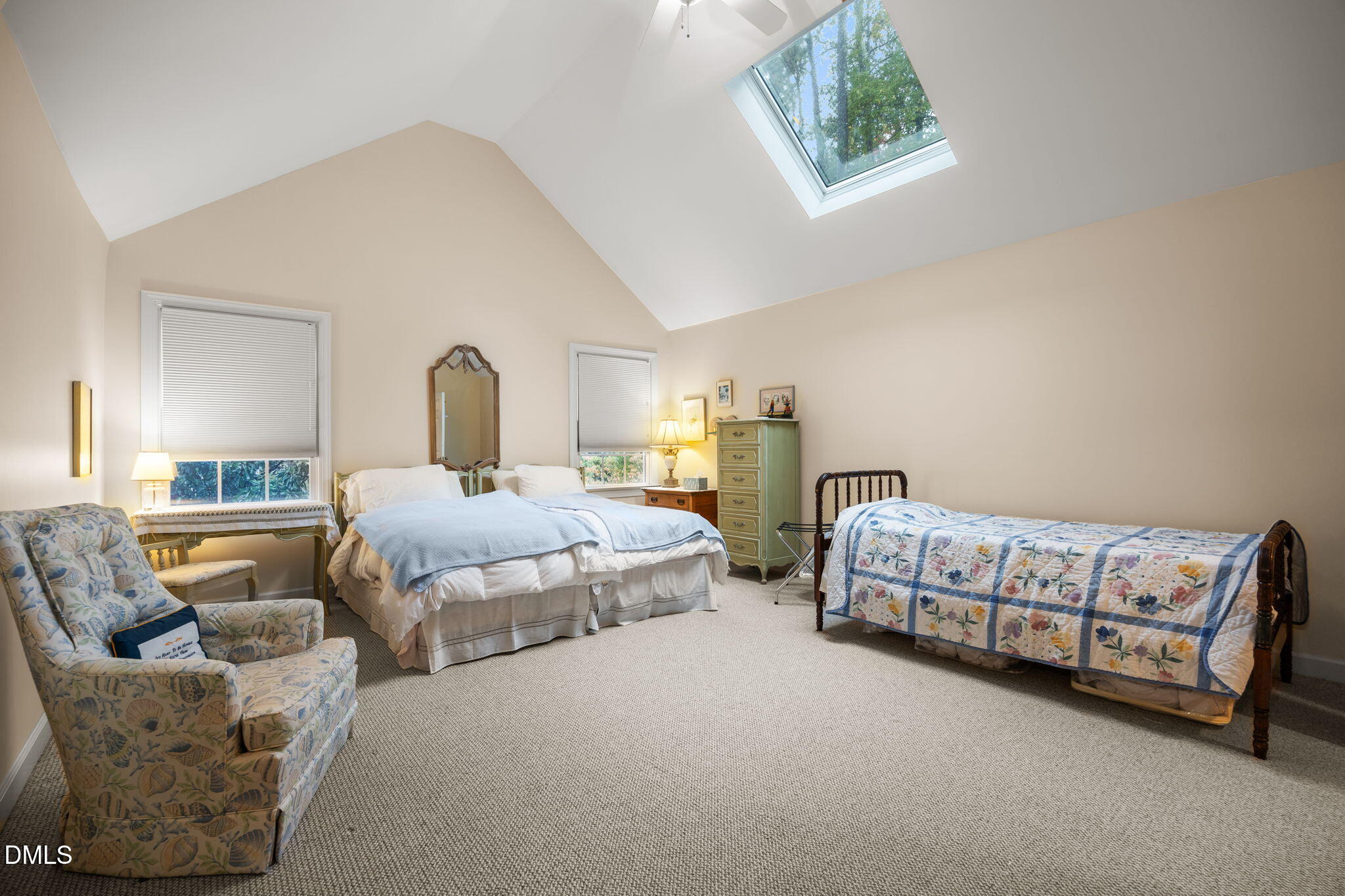 7417 Fontana Ridge Lane Raleigh, NC 27613 - Photo 29 of 54 a bedroom with a bed and a couch