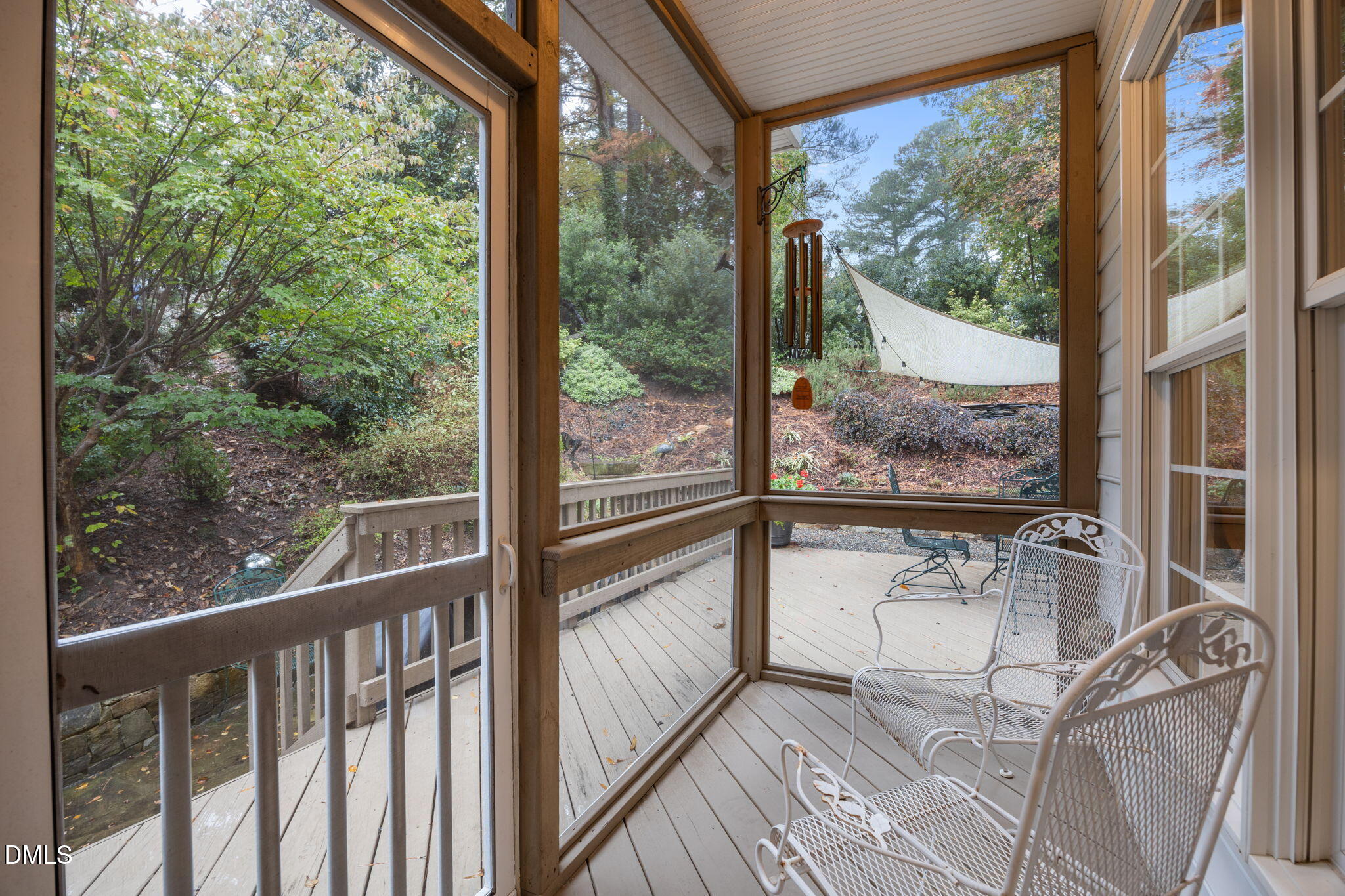 7417 Fontana Ridge Lane Raleigh, NC 27613 - Photo 40 of 54 a view of a room with wooden floor and iron stairs