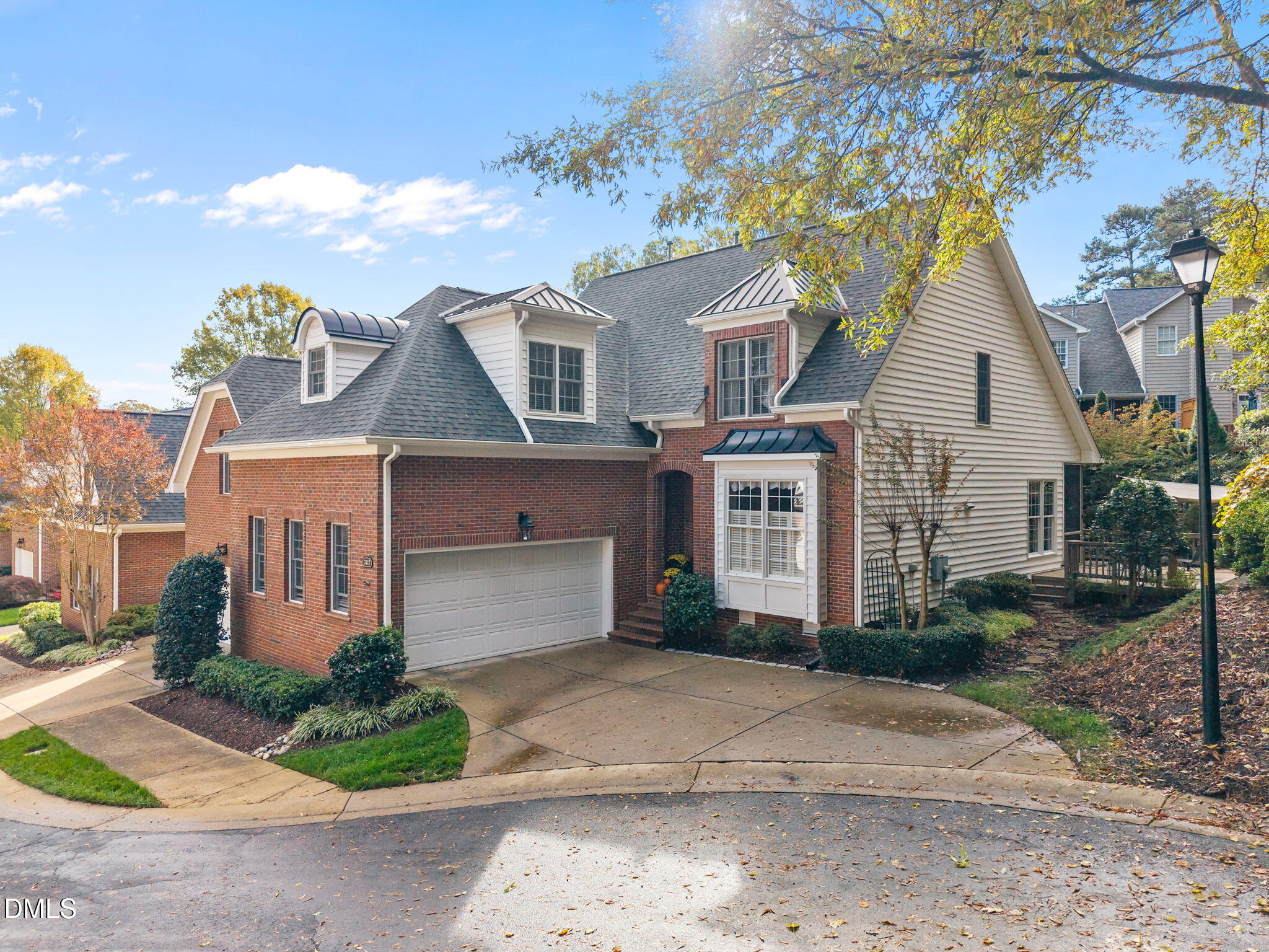 7417 Fontana Ridge Lane Raleigh, NC 27613 - Photo 49 of 54 a front view of a house with a yard and garage