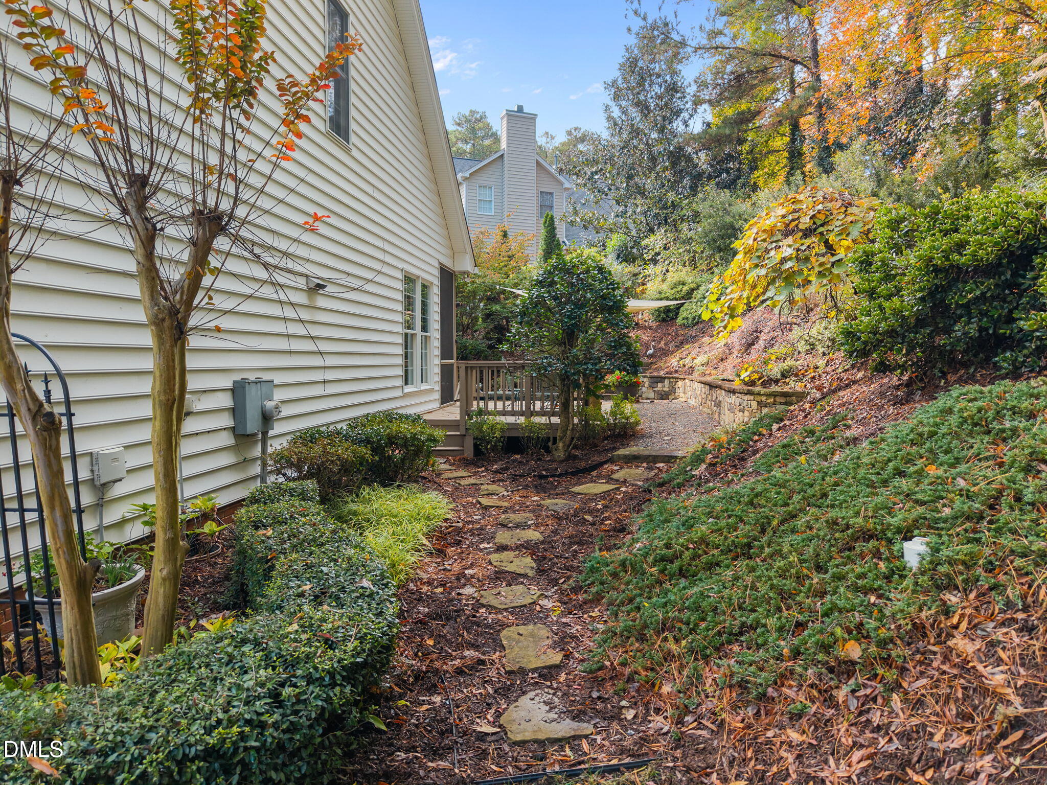 7417 Fontana Ridge Lane Raleigh, NC 27613 - Photo 50 of 54 a backyard of a house with outdoor seating and plants