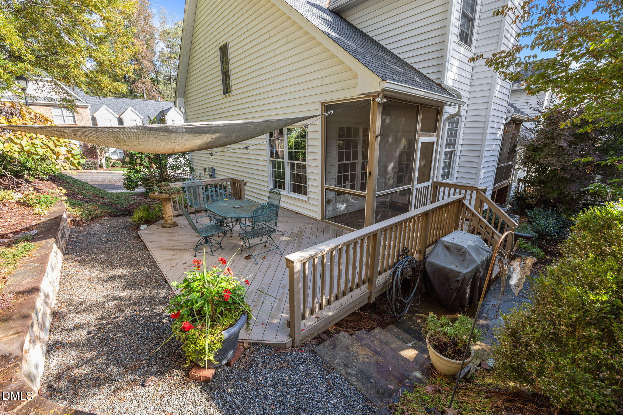 7417 Fontana Ridge Lane Raleigh, NC 27613 - Photo 5 of 54 a view of a chair and table in the patio