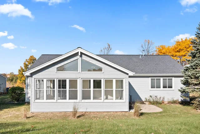 a view of garage yard and tree