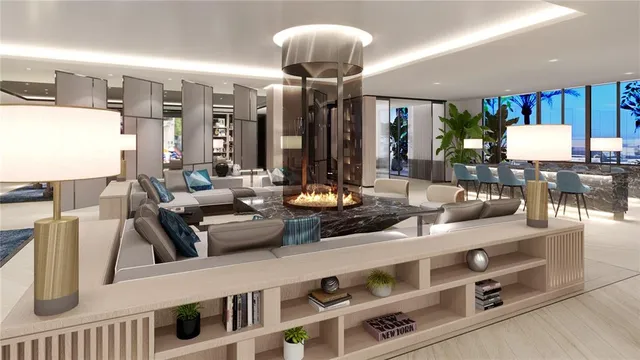 a very nice looking living room with furniture and chandelier