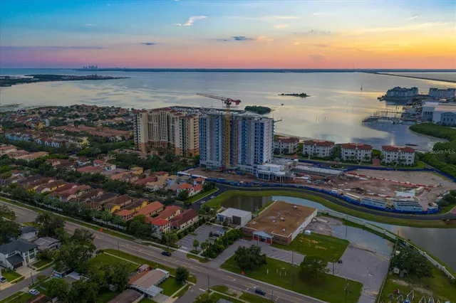 a view of outdoor space with signage and flags