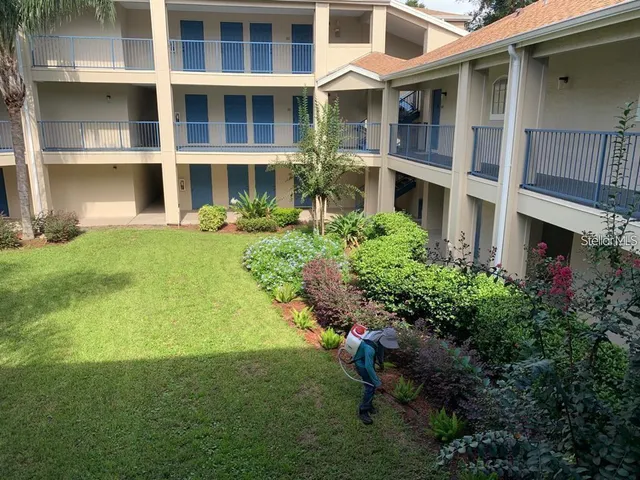 a house view with a garden space