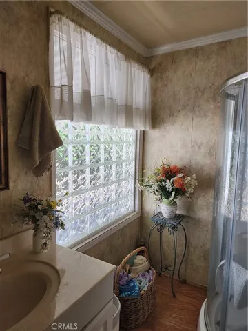 a bath room with a sink and a tub