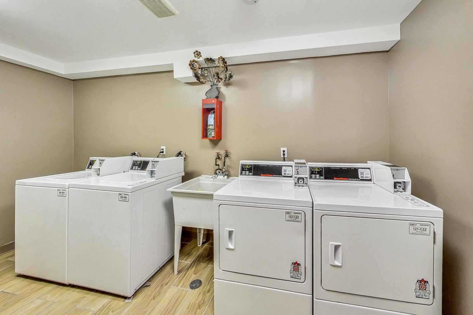 19398 Wolf Road, Unit 11 Mokena, IL 60448 - Photo 26 of 27 a utility room with dryer and washer