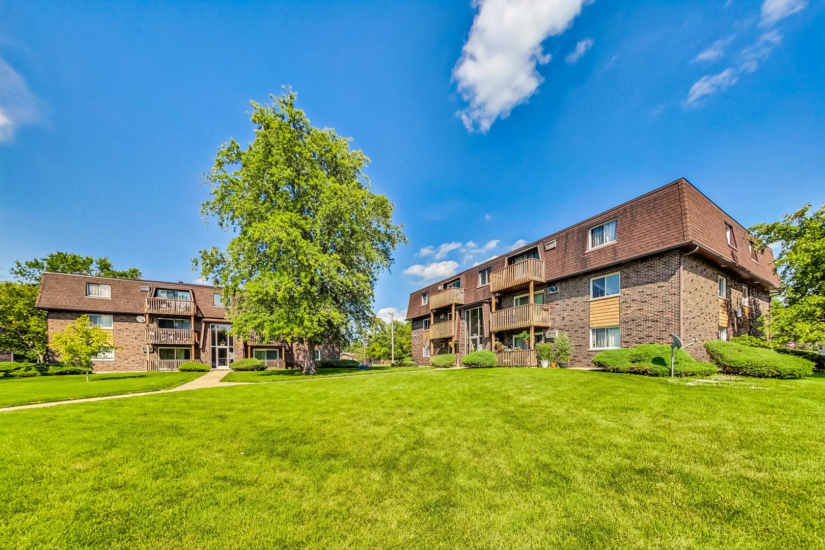 19398 Wolf Road, Unit 11 Mokena, IL 60448 - Photo 5 of 27 a view of house with a yard
