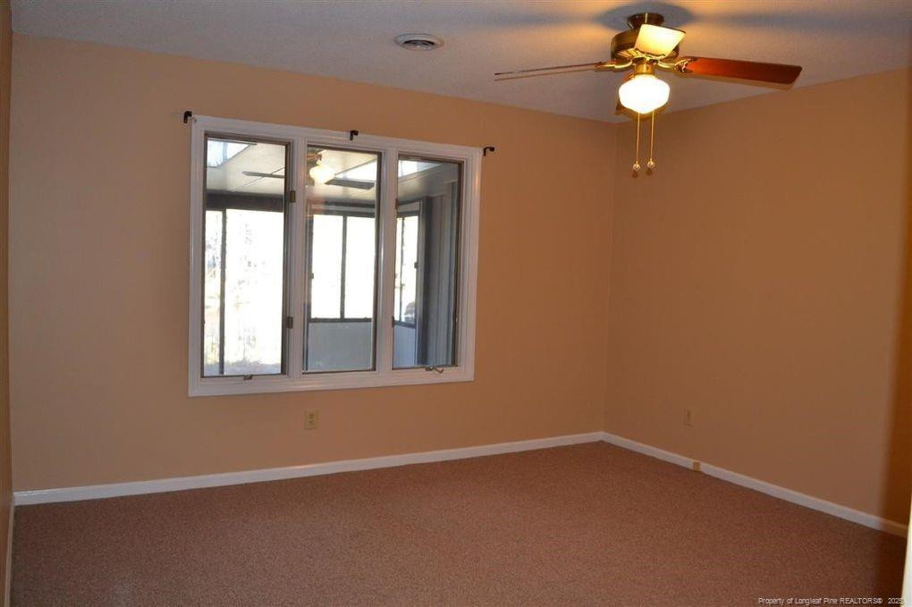 158 Cranes Cove Vass, NC 28394 - Photo 13 of 19 an empty room with a window