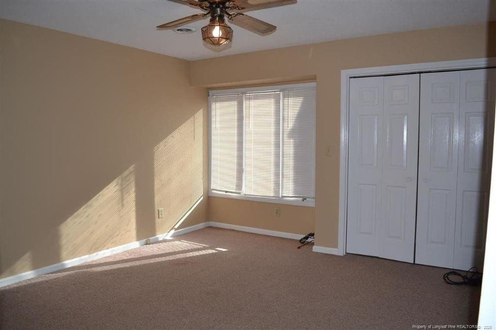158 Cranes Cove Vass, NC 28394 - Photo 18 of 19 a view of an empty room with a window