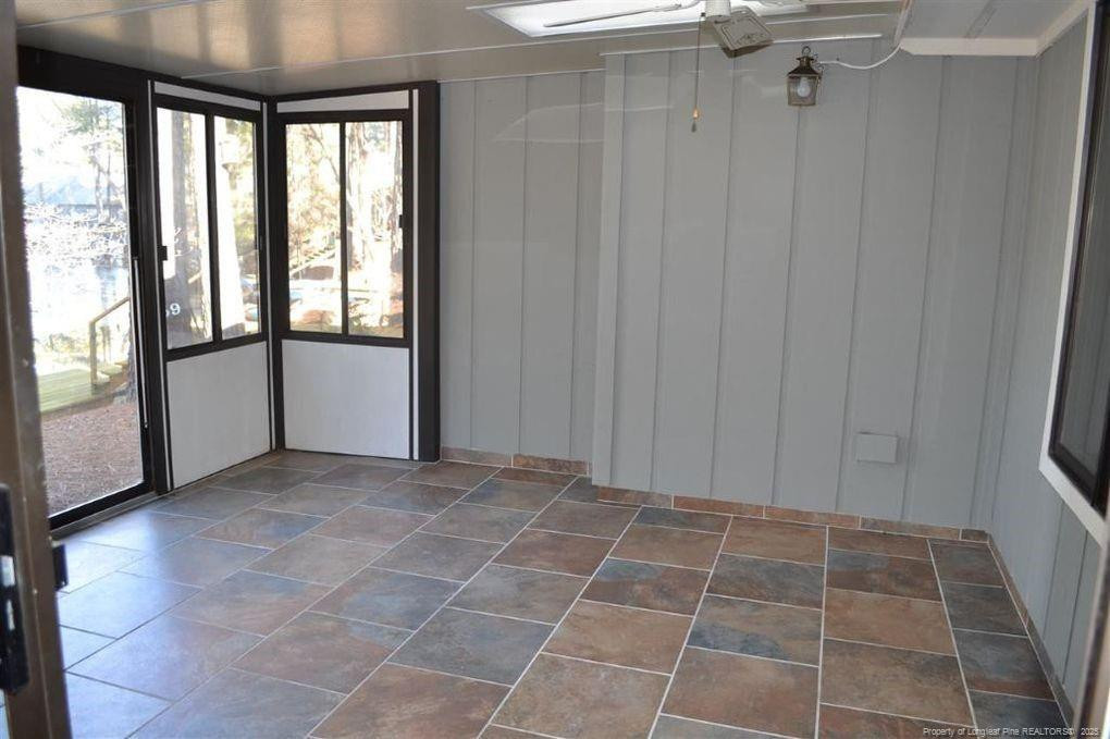 158 Cranes Cove Vass, NC 28394 - Photo 9 of 19 a view of an empty room with a window