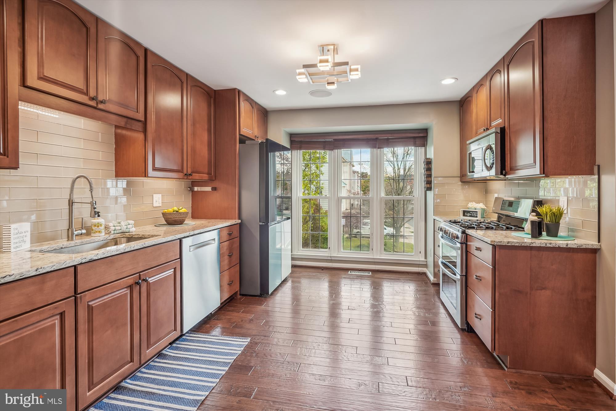 46940 Rabbitrun Terrace Sterling, VA 20164 - Photo 5 of 60 Renovated Kitchen with Stainless Appliances