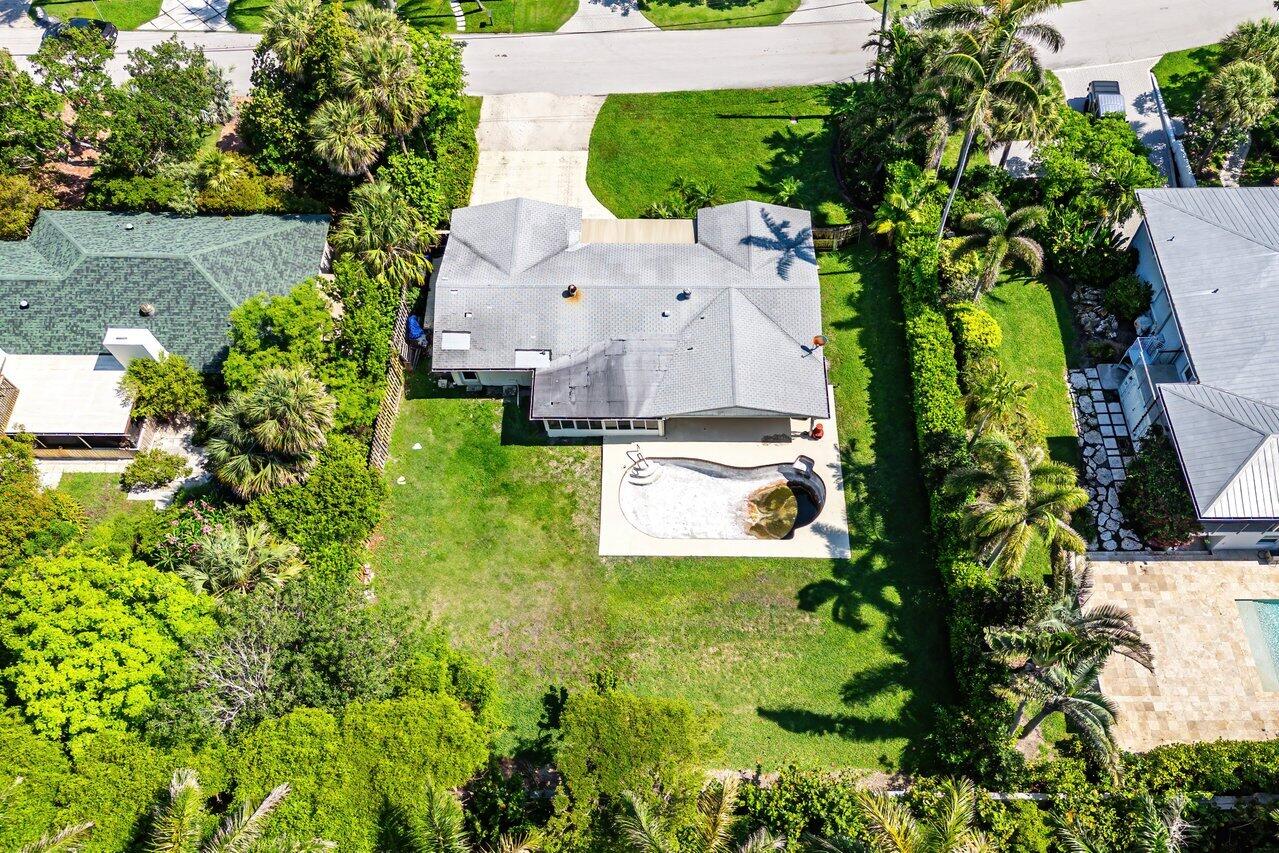 19 Harbour Drive South Ocean Ridge, FL 33435 - Photo 5 of 9 an aerial view of residential houses with outdoor space and a car park