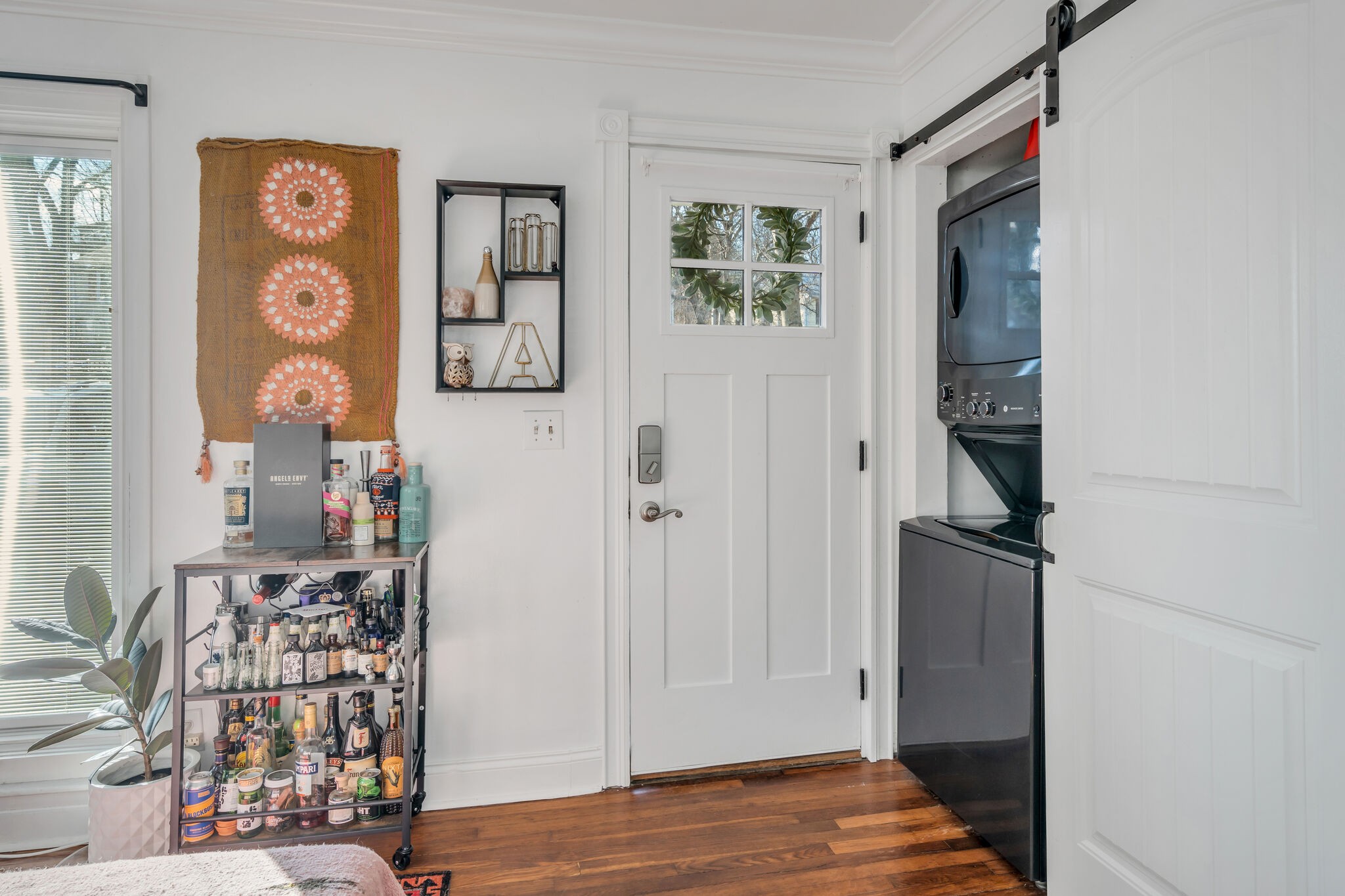 911 South 14th Street Nashville, TN 37206 - Photo 7 of 30 a view of a bedroom with wooden floor and windows