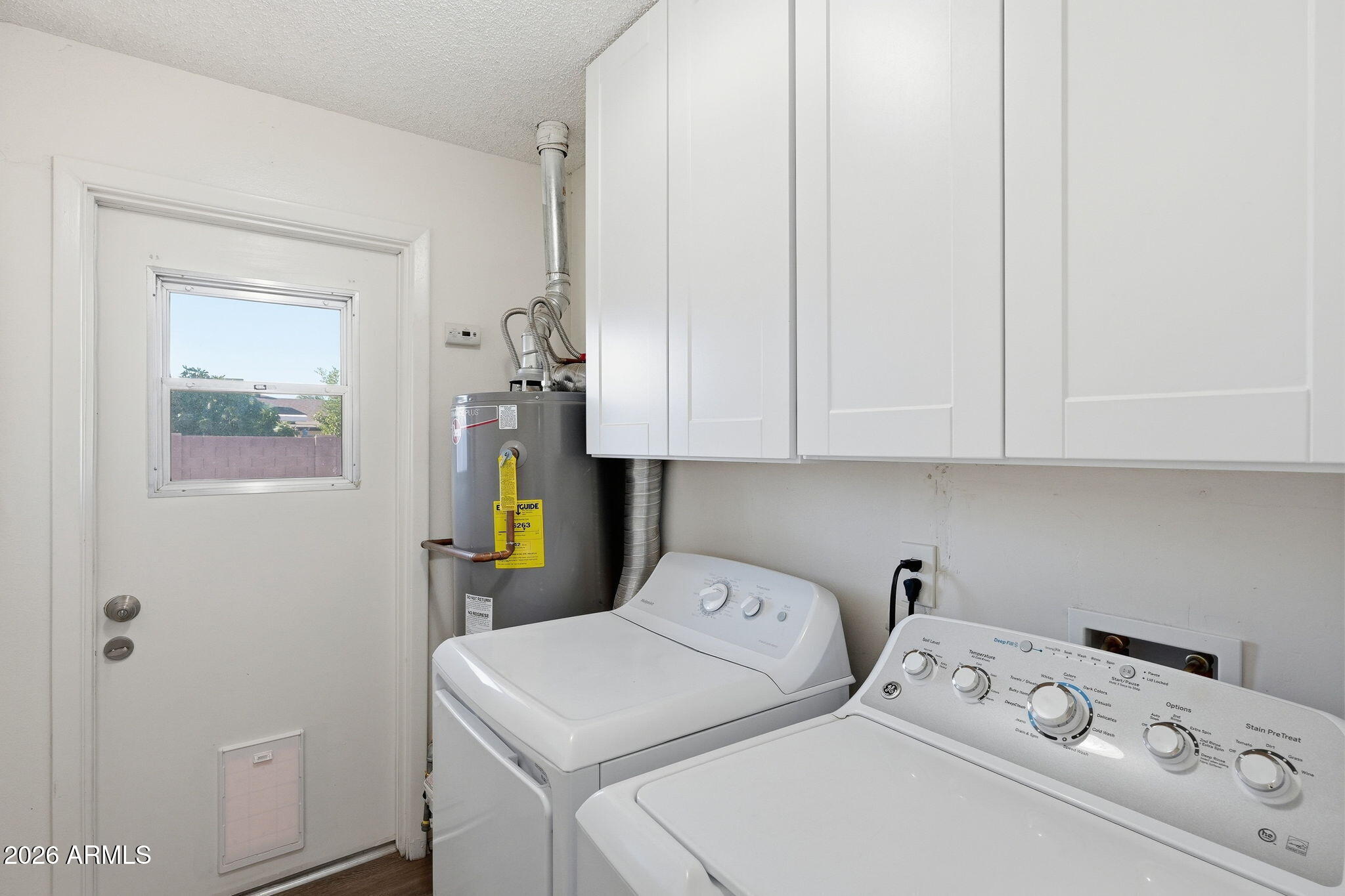 2302 East Nisbet Road Phoenix, AZ 85022 - Photo 14 of 22 a utility room with dryer and washer