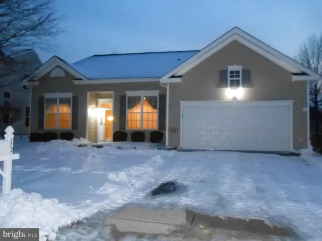 a view of empty room with windows