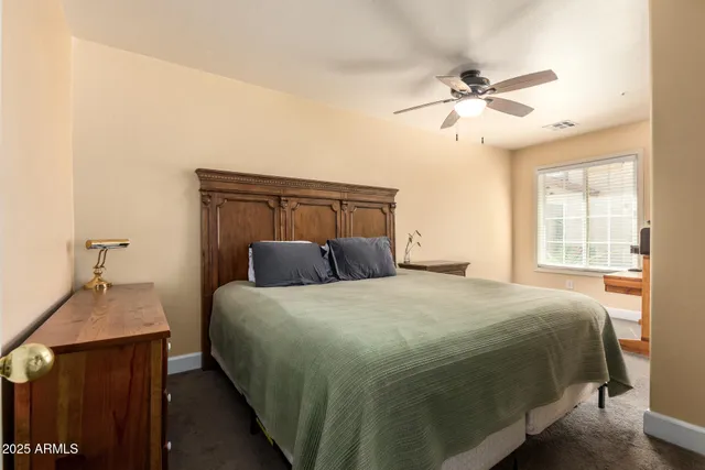 a kitchen with a sink appliances and cabinets