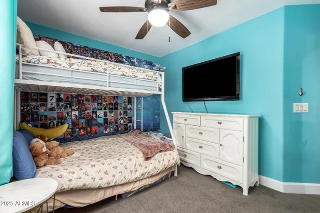 a bed room with furniture and a window