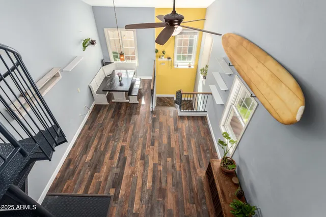 a bedroom with bed and a chandelier