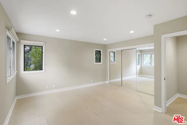 a view of hallway with livingroom