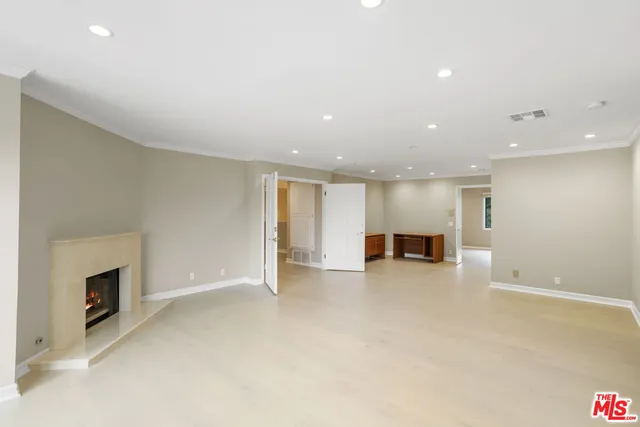 a large bathroom with a large tub sink and double vanity
