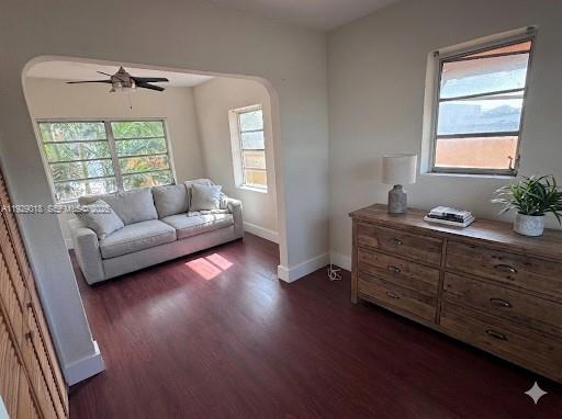 20 Northwest 17th Place, Unit 18 Miami, FL 33125 - Photo 8 of 13 a living room with furniture and a window