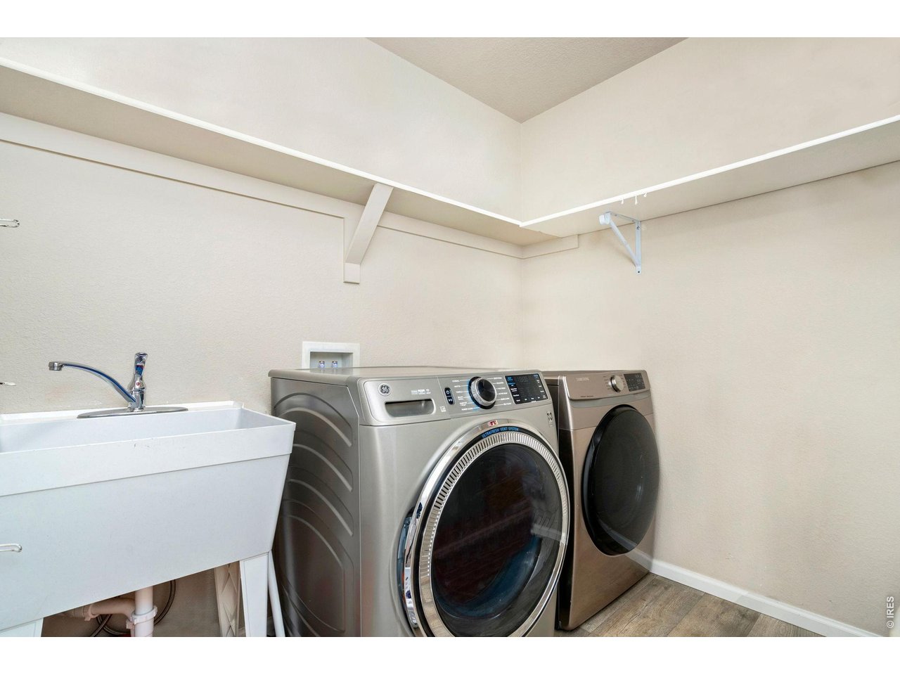 5259 Odessa Lake Street Timnath, CO 80547 - Photo 21 of 30 a utility room with dryer and washer