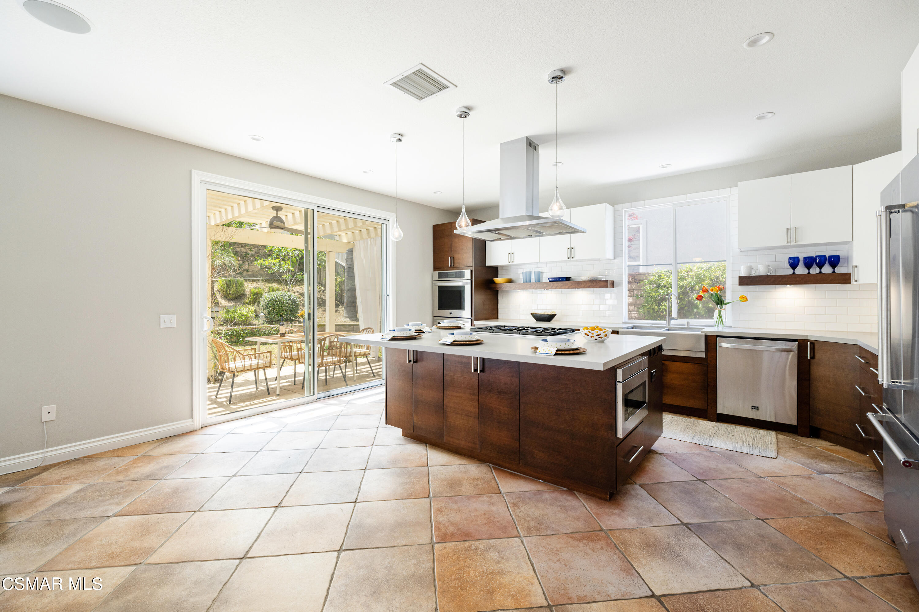 110 Park Hill Road Simi Valley, CA 93065 - Photo 11 of 36 a kitchen with stainless steel appliances granite countertop a stove a sink a counter top space and cabinets
