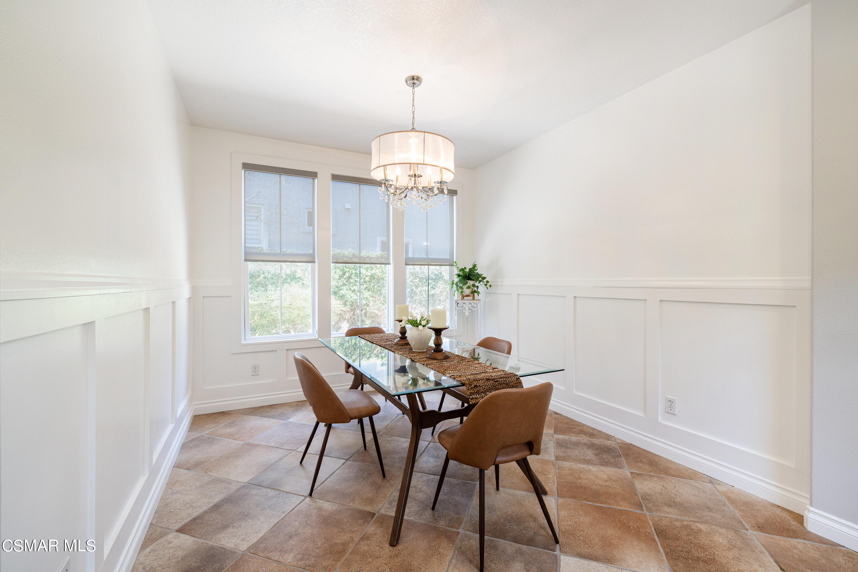 110 Park Hill Road Simi Valley, CA 93065 - Photo 17 of 36 a dining room with furniture a chandelier and a rug