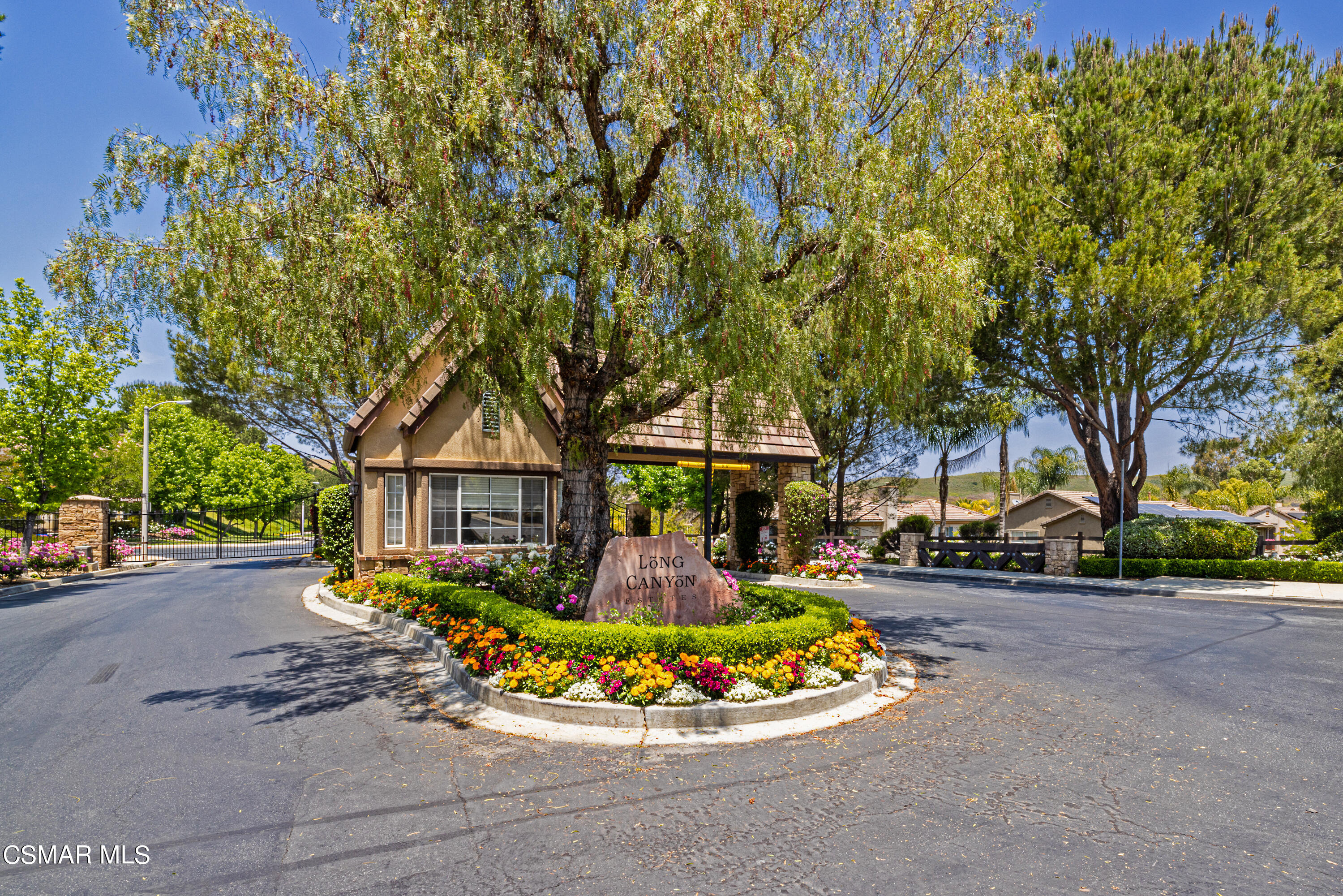 110 Park Hill Road Simi Valley, CA 93065 - Photo 2 of 36 a front view of a house with a yard