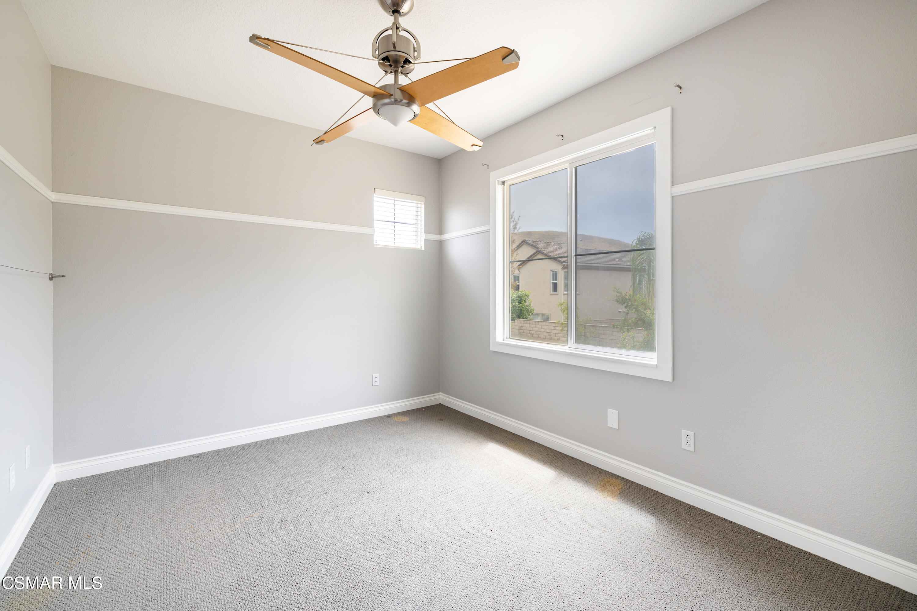 110 Park Hill Road Simi Valley, CA 93065 - Photo 29 of 36 an empty room with windows and fan
