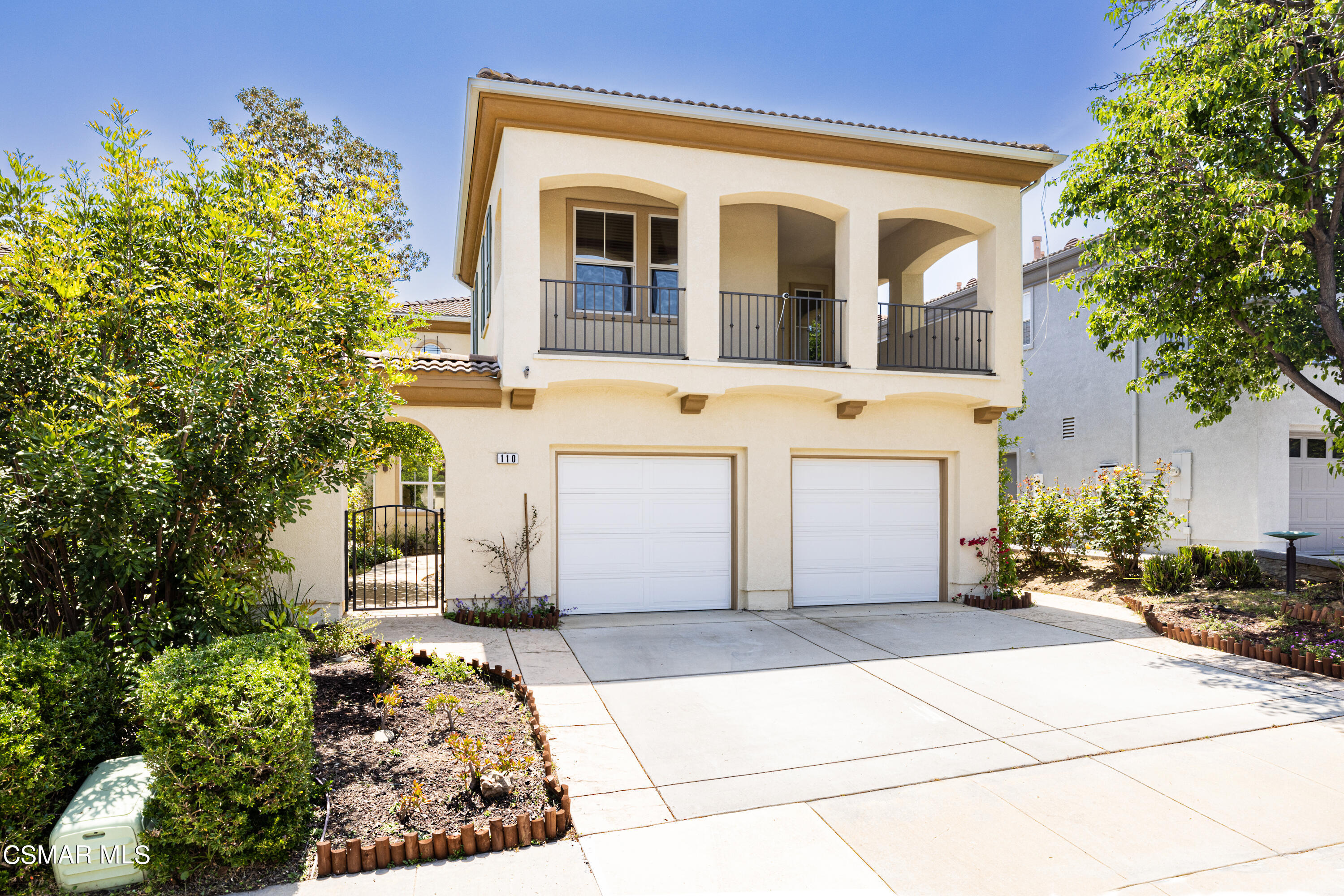 110 Park Hill Road Simi Valley, CA 93065 - Photo 4 of 36 a front view of a house with a garden